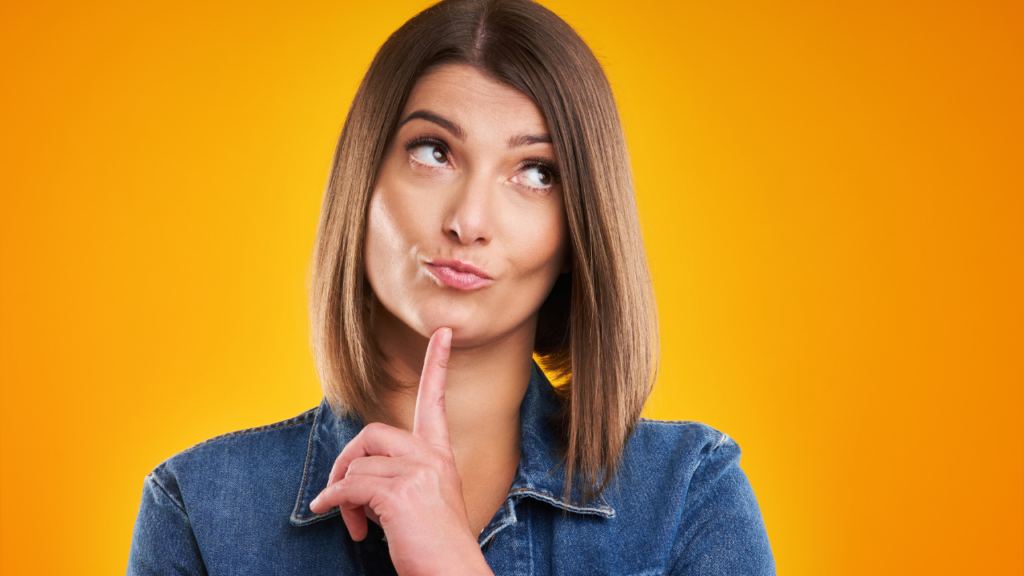 Woman thinking about whether she should move her current mortgage to a new home