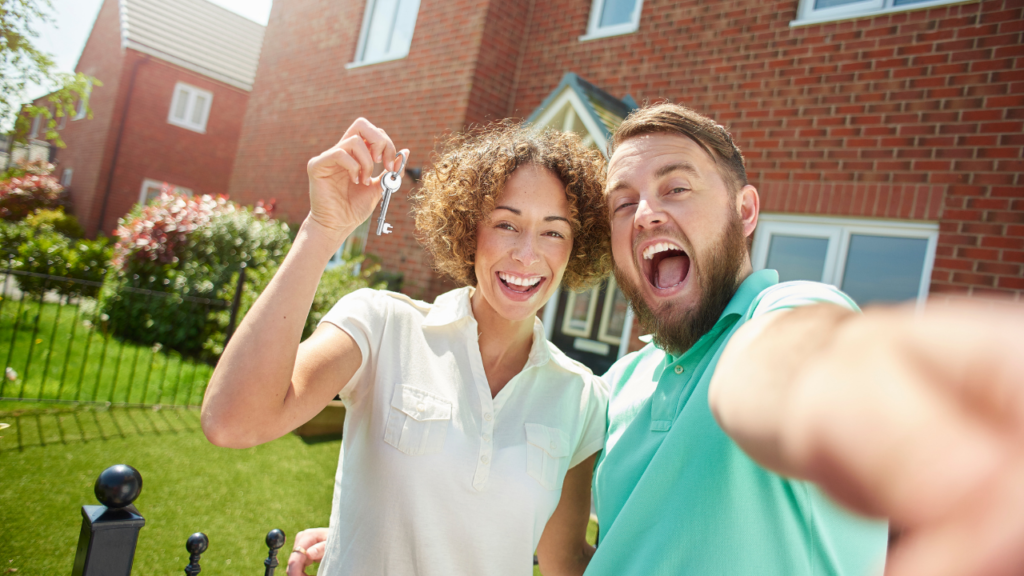First Time Buyers celebrating moving in day after getting the right mortgage advice