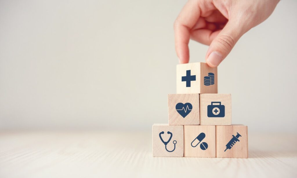 Blocks representing the benefits of getting health insurance