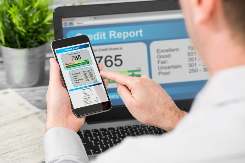 Man checking his credit score after learning how to check credit score