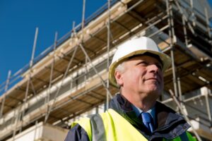 Property developer on site after raising property development finance