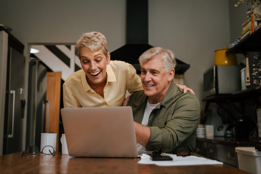 Couple celebrating after paying off mortgage